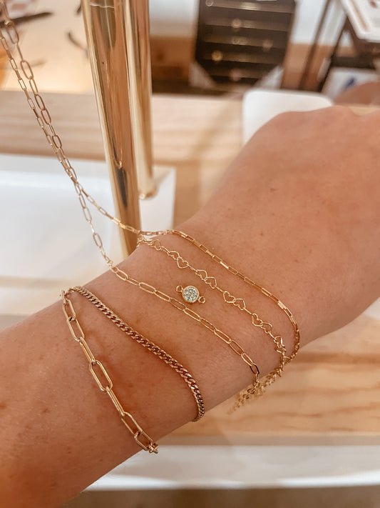 Book a permanent jewelry appointment at Balboa Gold Costa Mesa CA